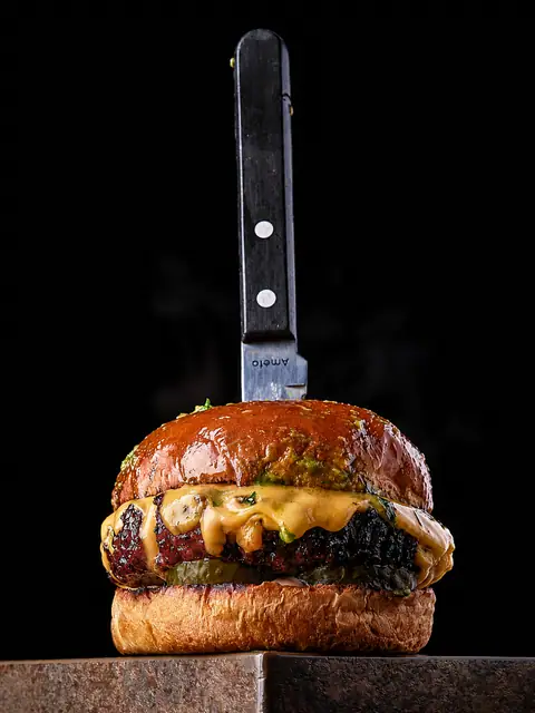 Burger with a steak knife